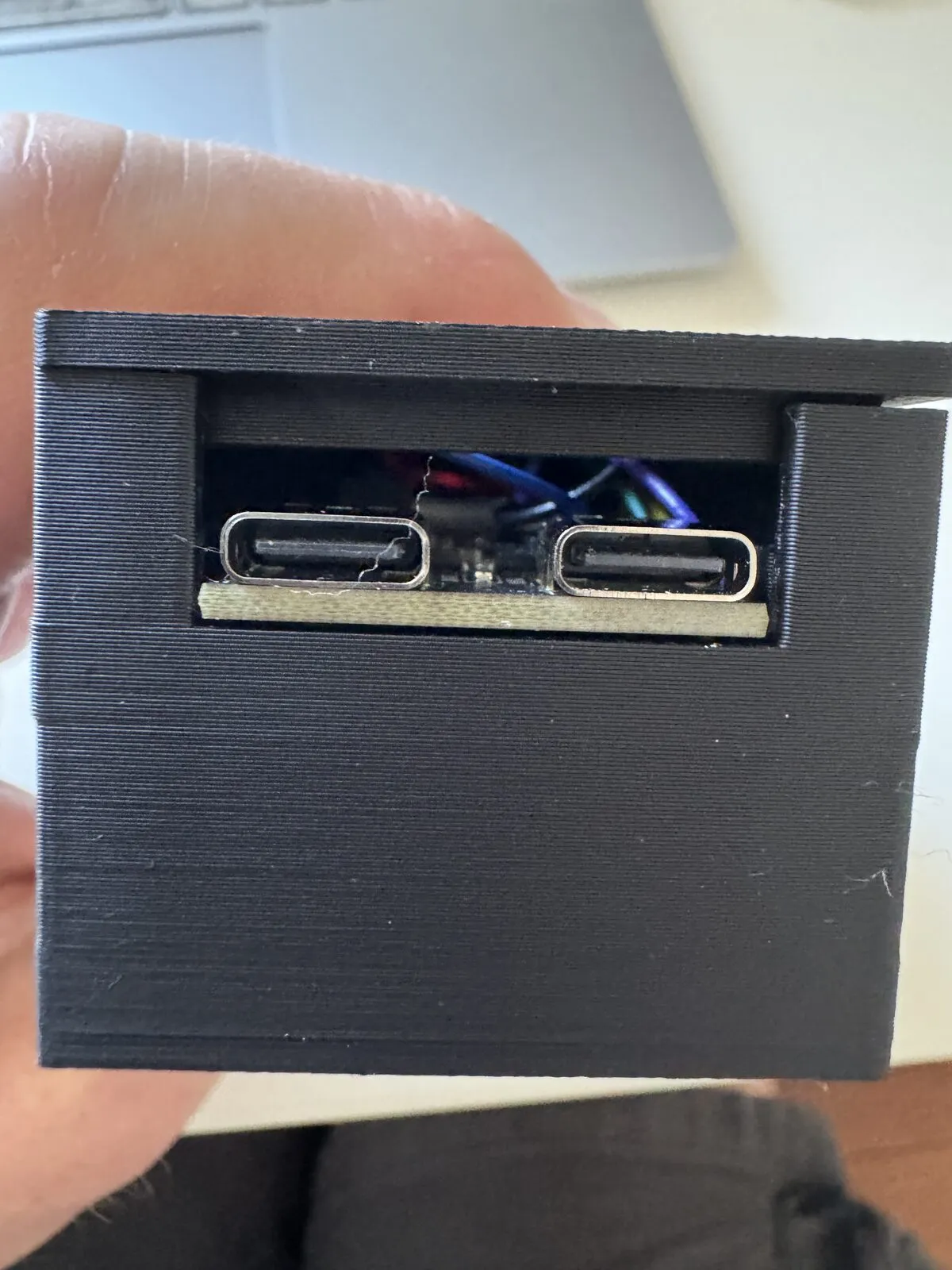 The USB end of the second print: one wide opening through which the board could slide out